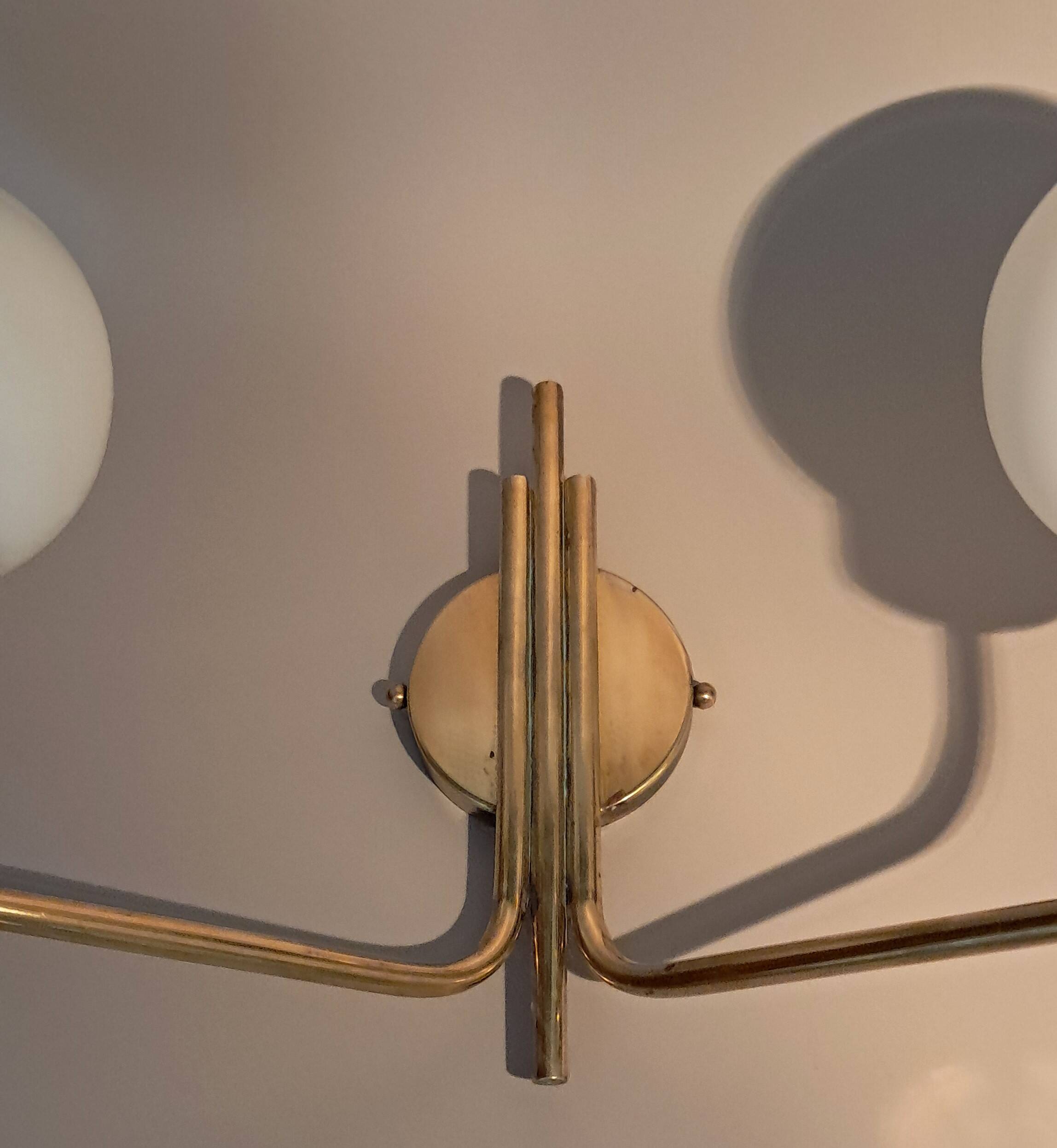 Brass and opaline two-light wall lamp, 1960