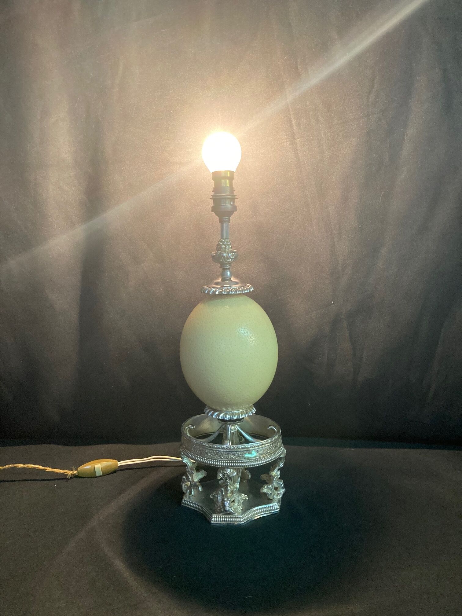 Old lamp foot silver metal and ostrich egg late nineteenth century