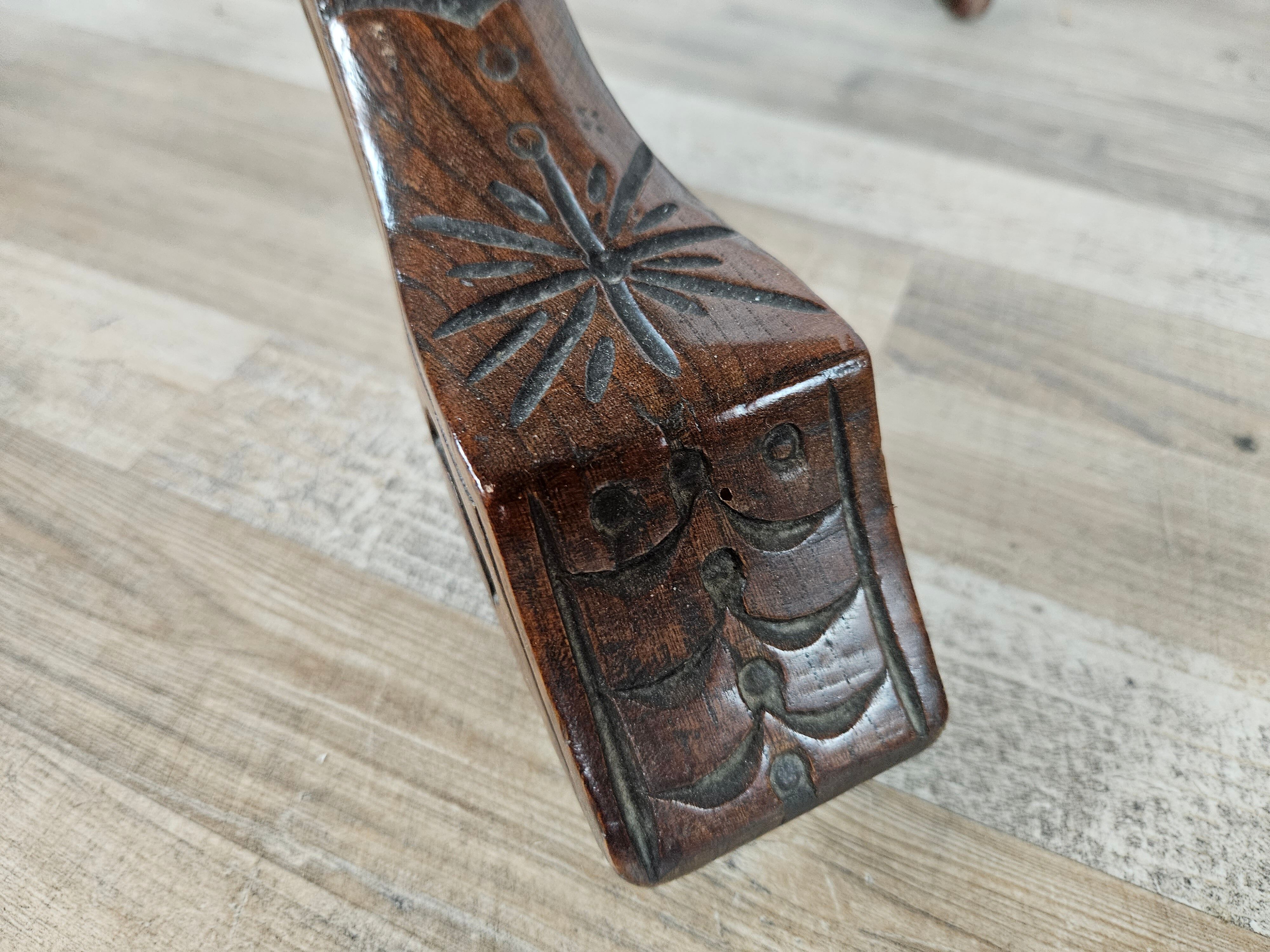 Coffee table in walnut with maple inlays and wheels