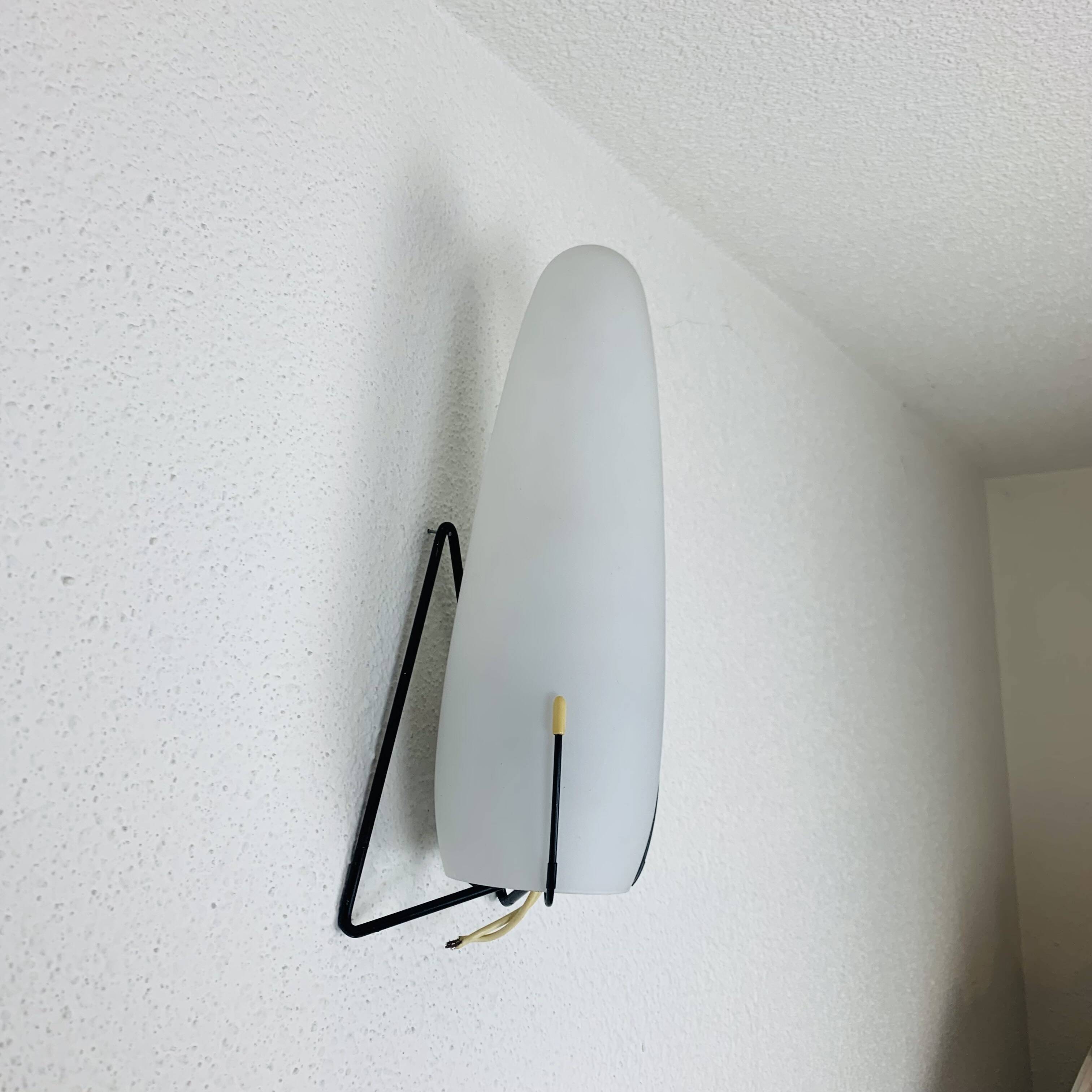 Louis Kalff wall lamp from the 50s, opaline