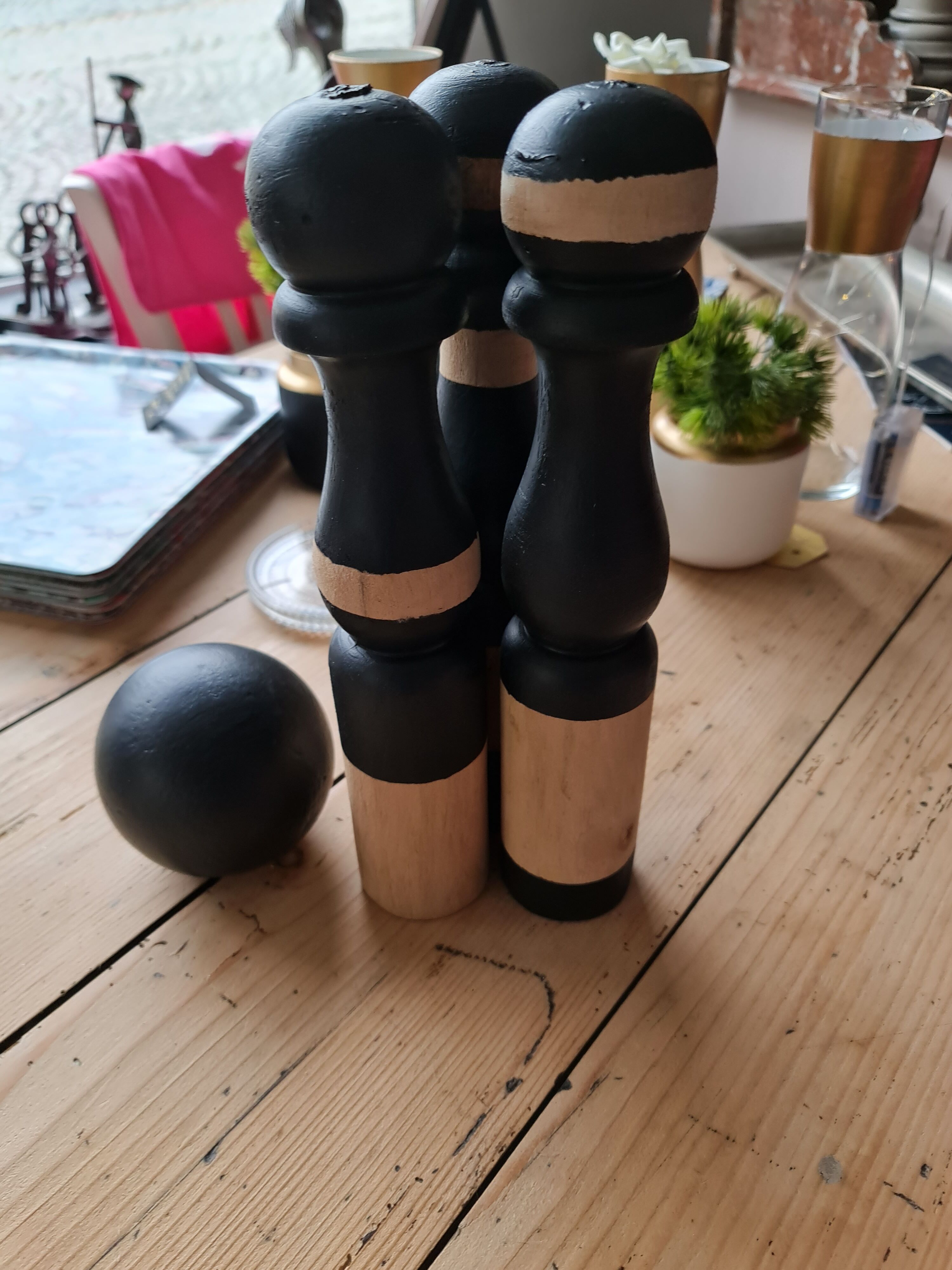 Lot of 3 pins and a black and rough ball