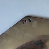 Set of three silver metal bottle bottoms