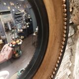 Miroir convexe cadre marron et noir