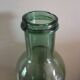Bouteille, vase en verre vert