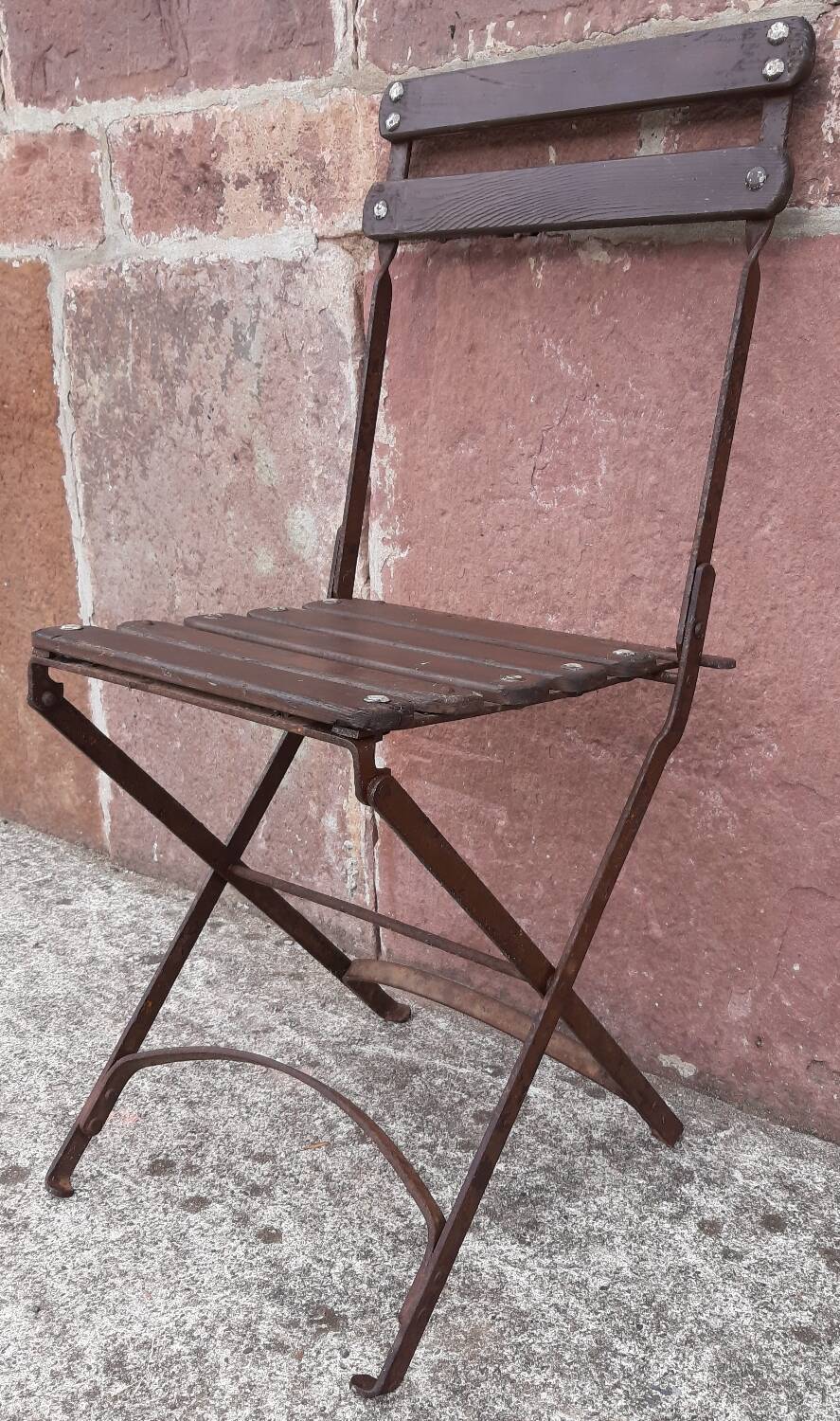 Foldable wrought iron chair
