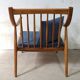 Pair of cozy teak armchairs with cushions