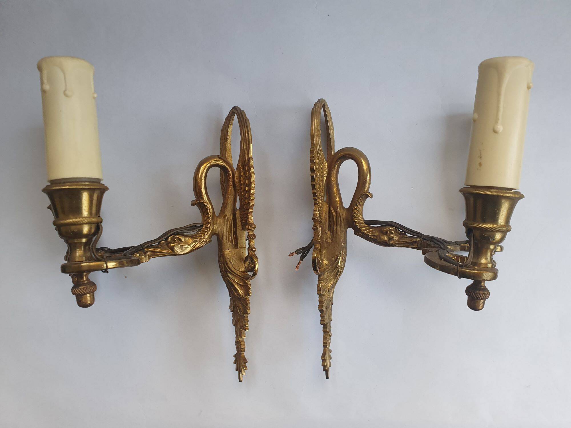 Pair of wall sconces candle holders in Empire style in bronze