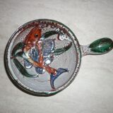 Frying pan with fat lava and ceramic fish decor