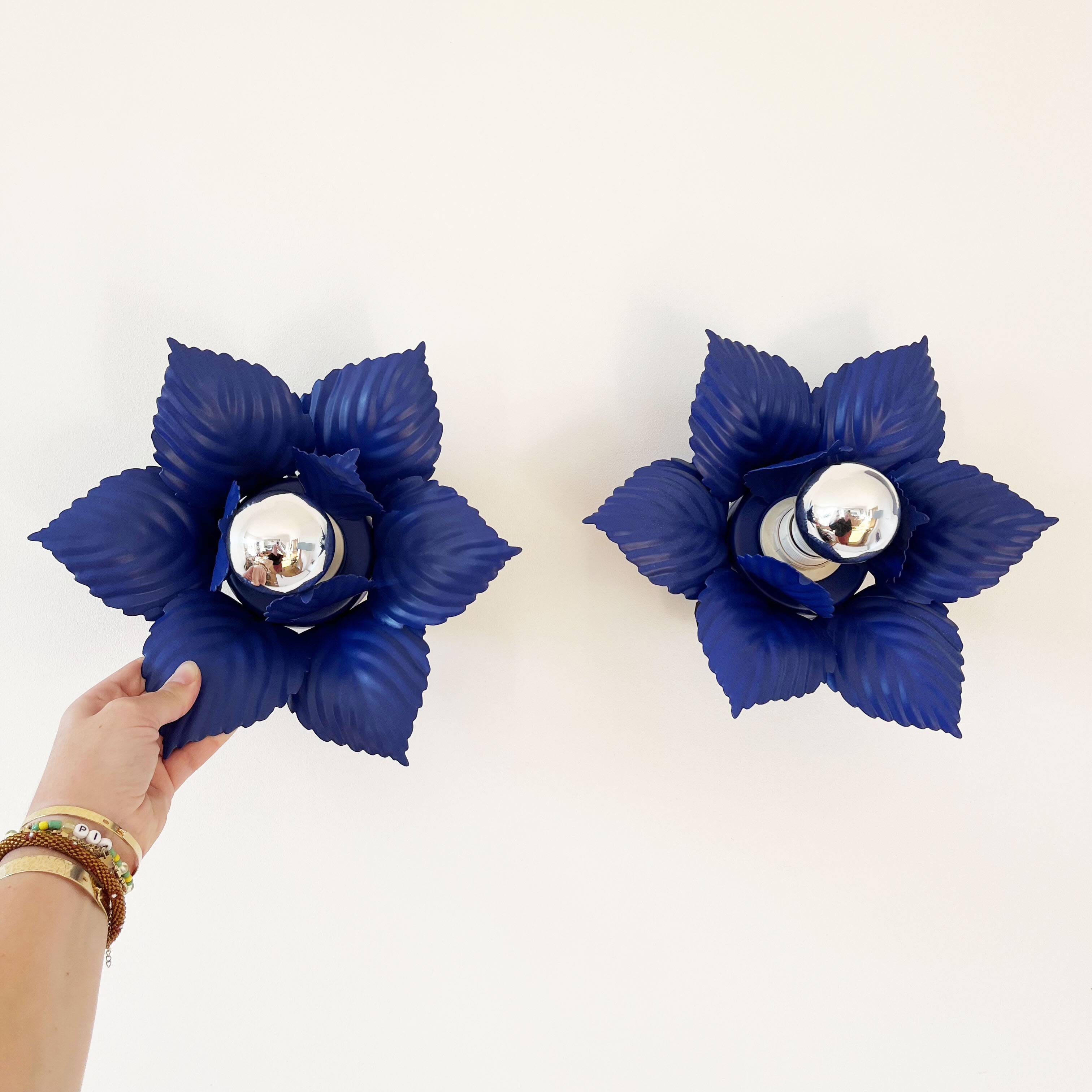 Pair of vintage Masca blue metal flower wall lights