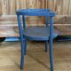 Curved wooden armchair from the late 19th/early 20th century.