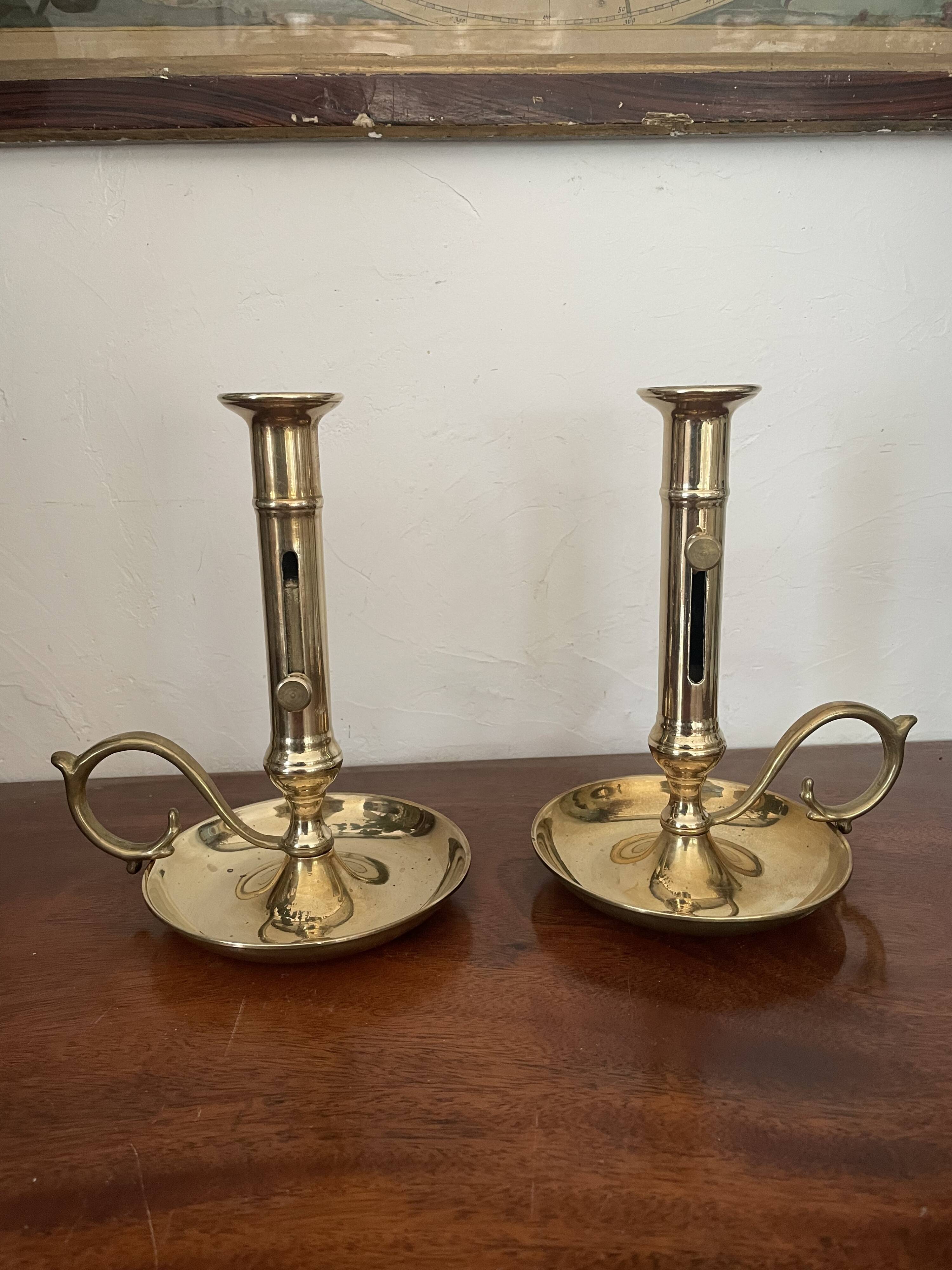 Pair of brass candle holders