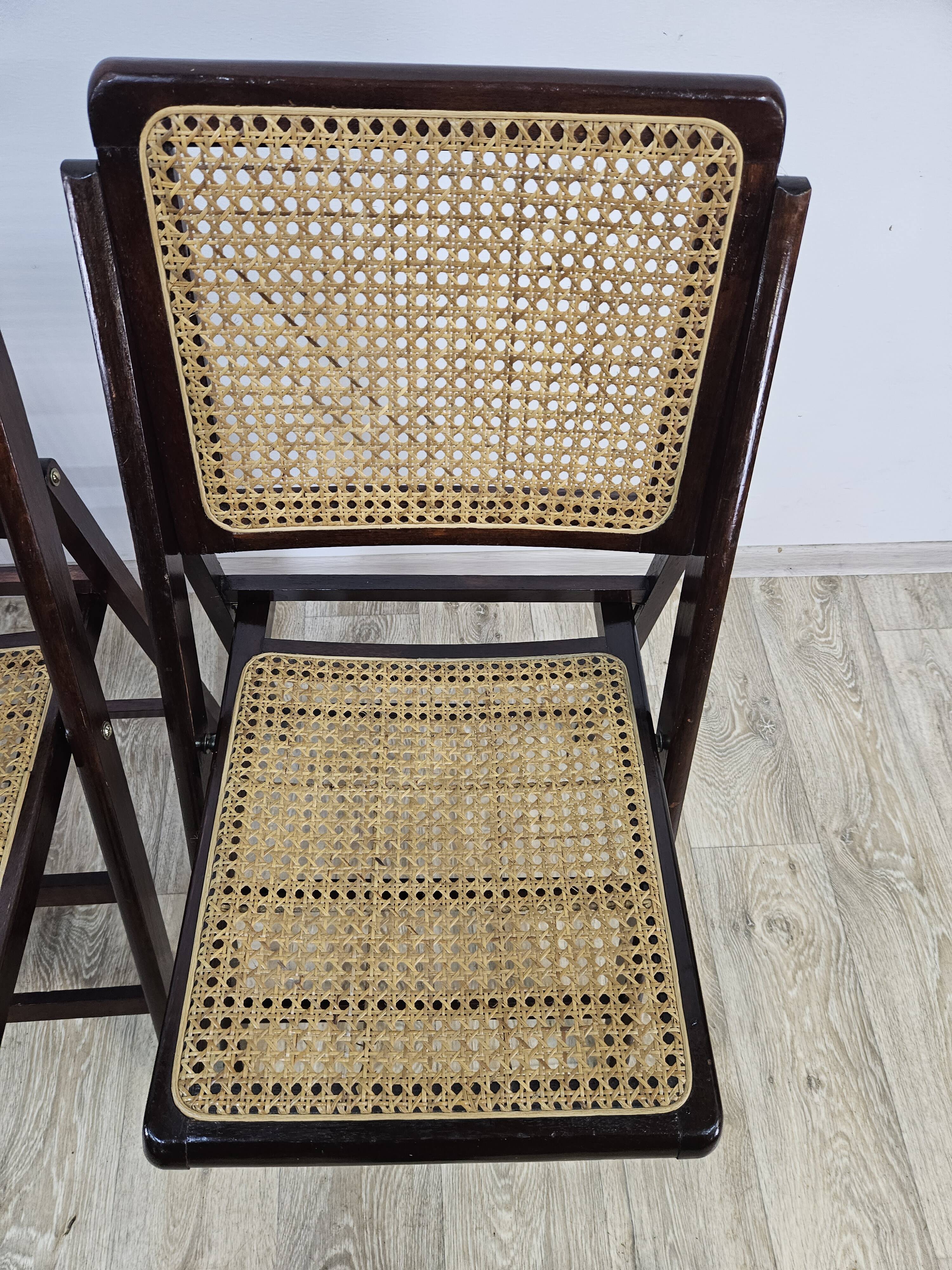 Folding wooden chairs with raffia, 1970s.