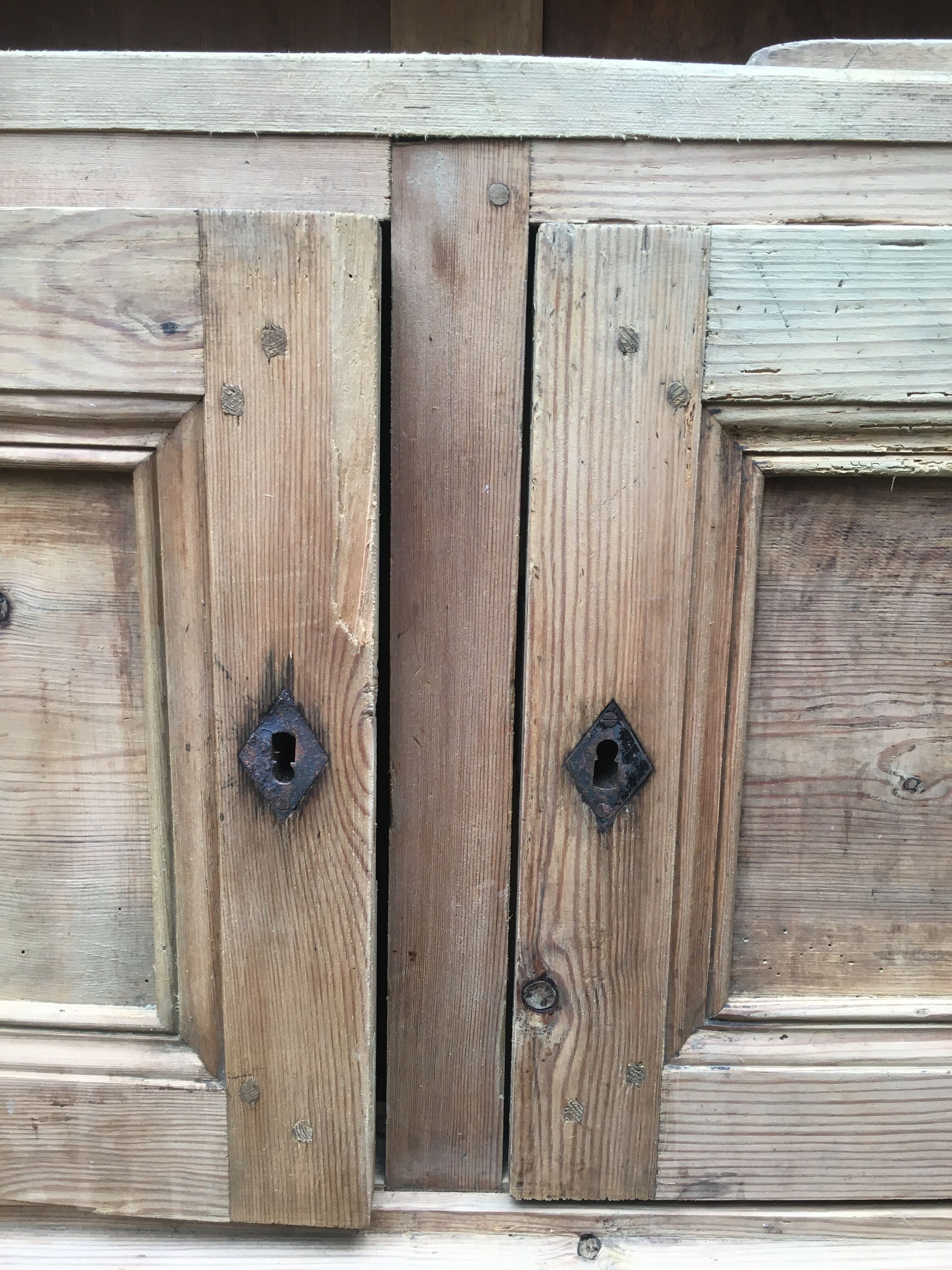 Wooden cabinet with interior doors