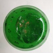 Vase en verre soufflé vert début XXème