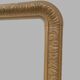 Louis Philippe mirror in wood and patinated stucco, 19th century.