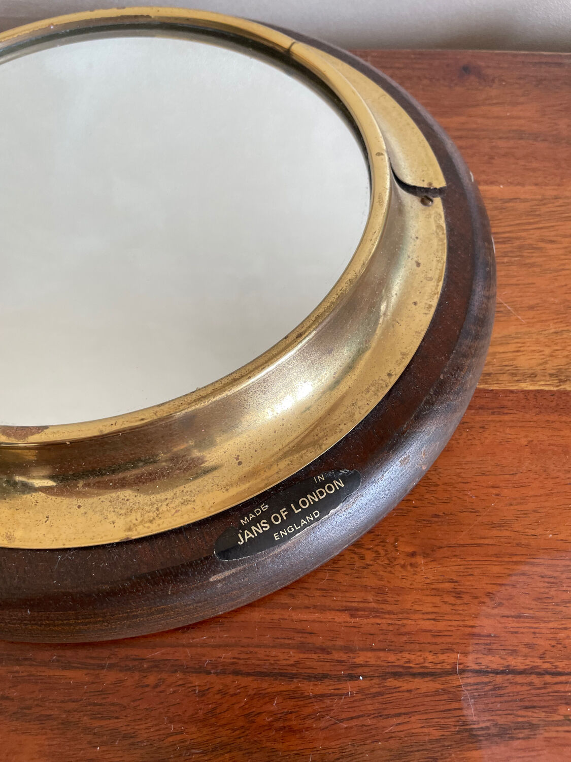 Wood and brass mirror