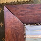 Oak mirror and old golden border