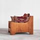 Sculptural lounge chair in solid oak from the 1940s.