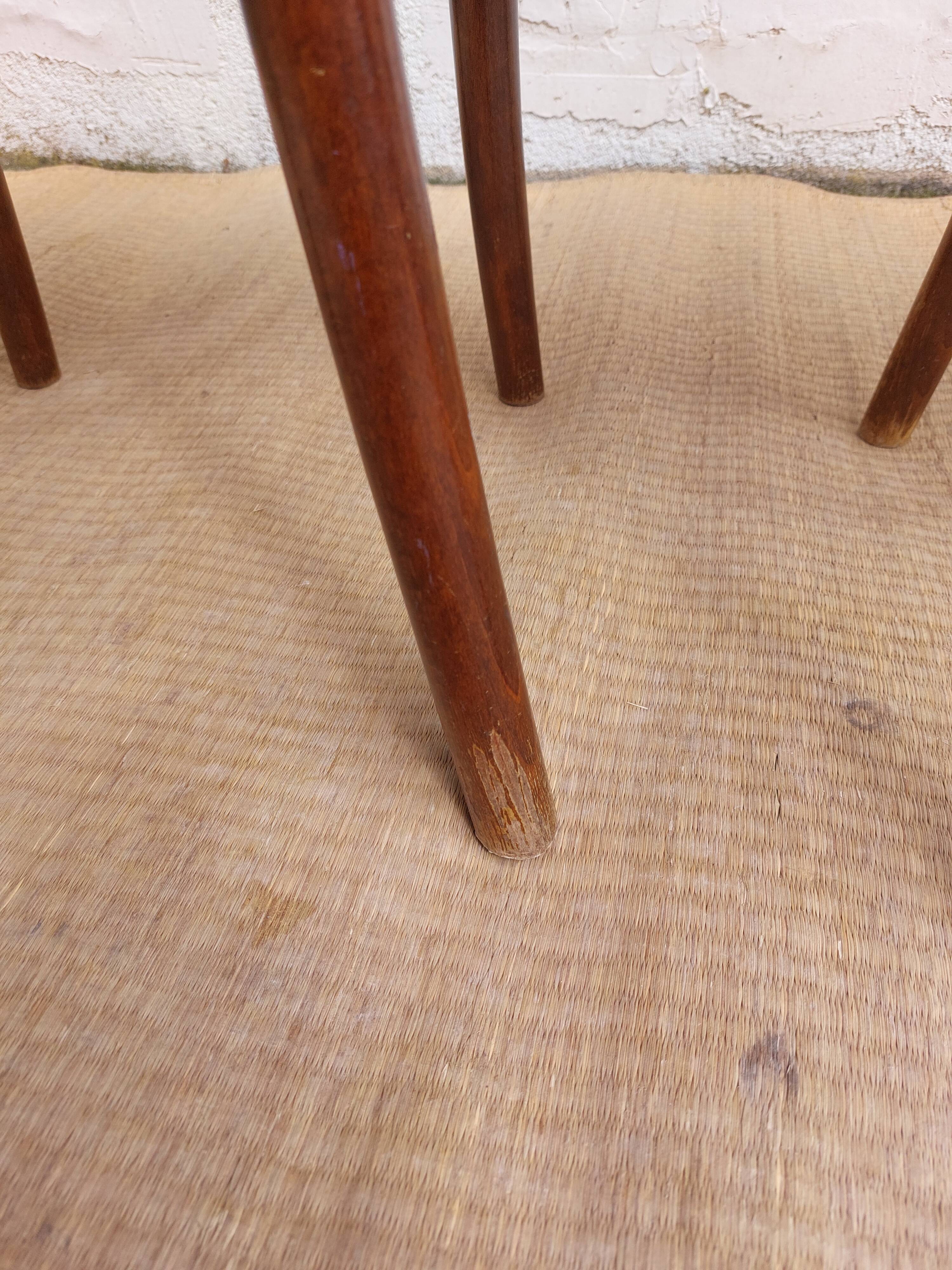 pair of bistro chairs, curved wood and pattern on the seat