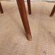 pair of bistro chairs, curved wood and pattern on the seat