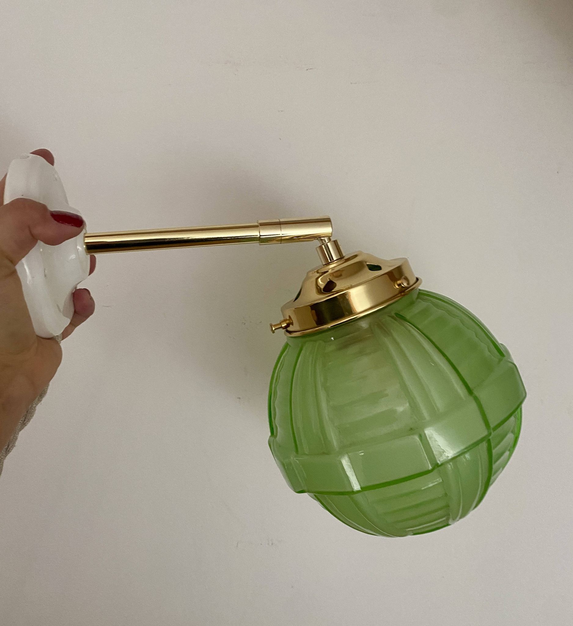 Vintage art deco globe wall light in green glass