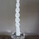 A vintage star flower glass candlestick.