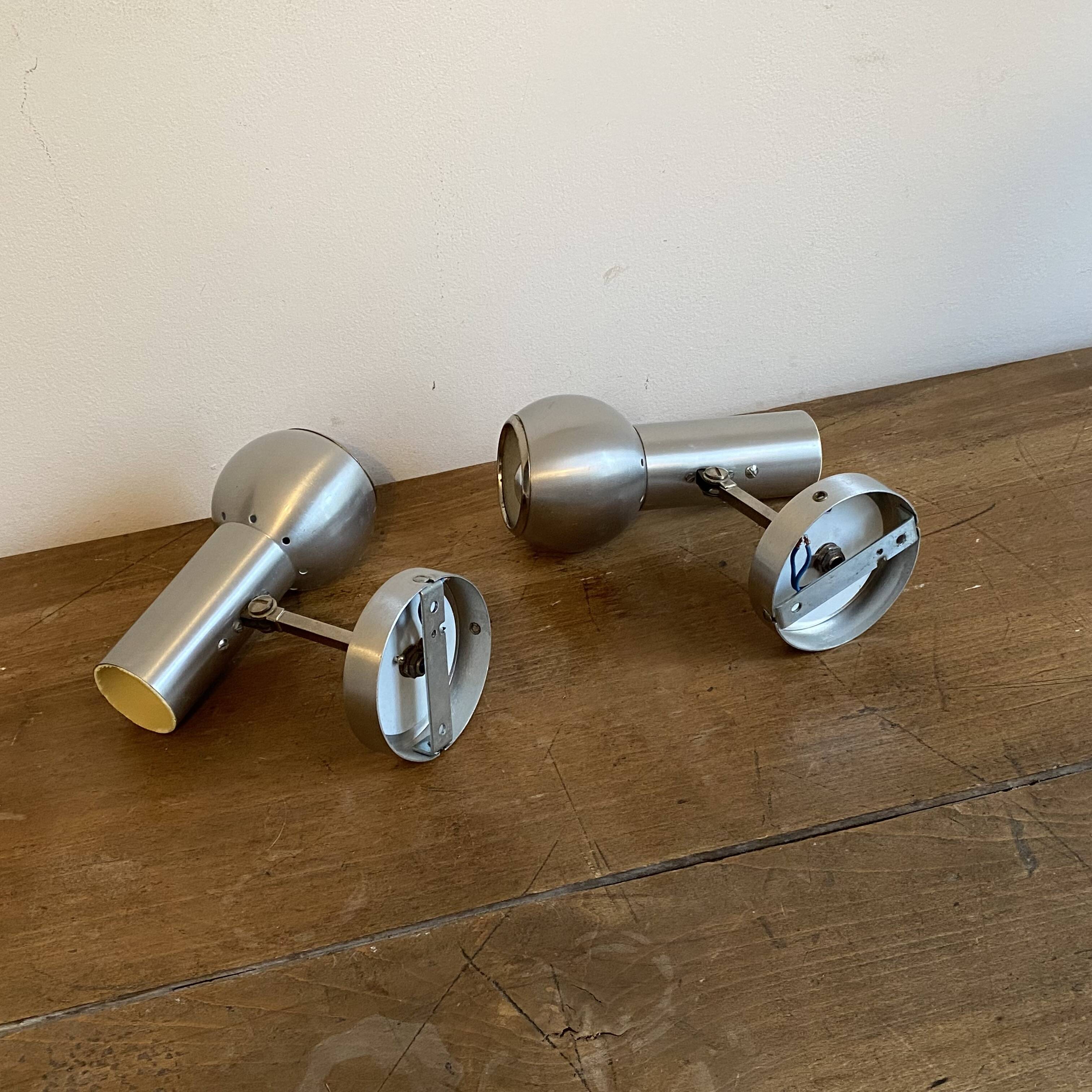 Pair of Eye Ball wall lights. 1970. Brushed stainless steel.