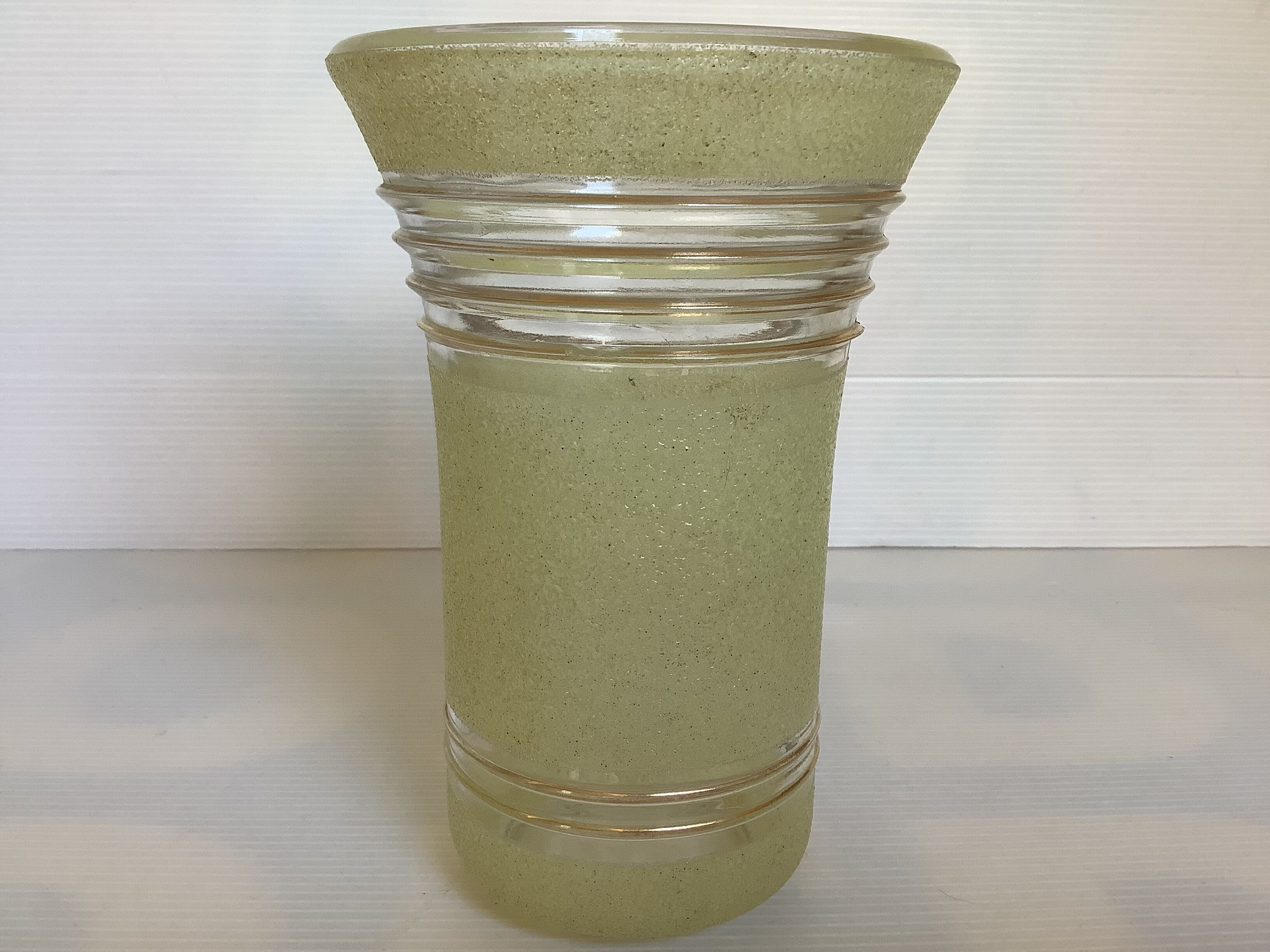 Old yellow frosted glass vase