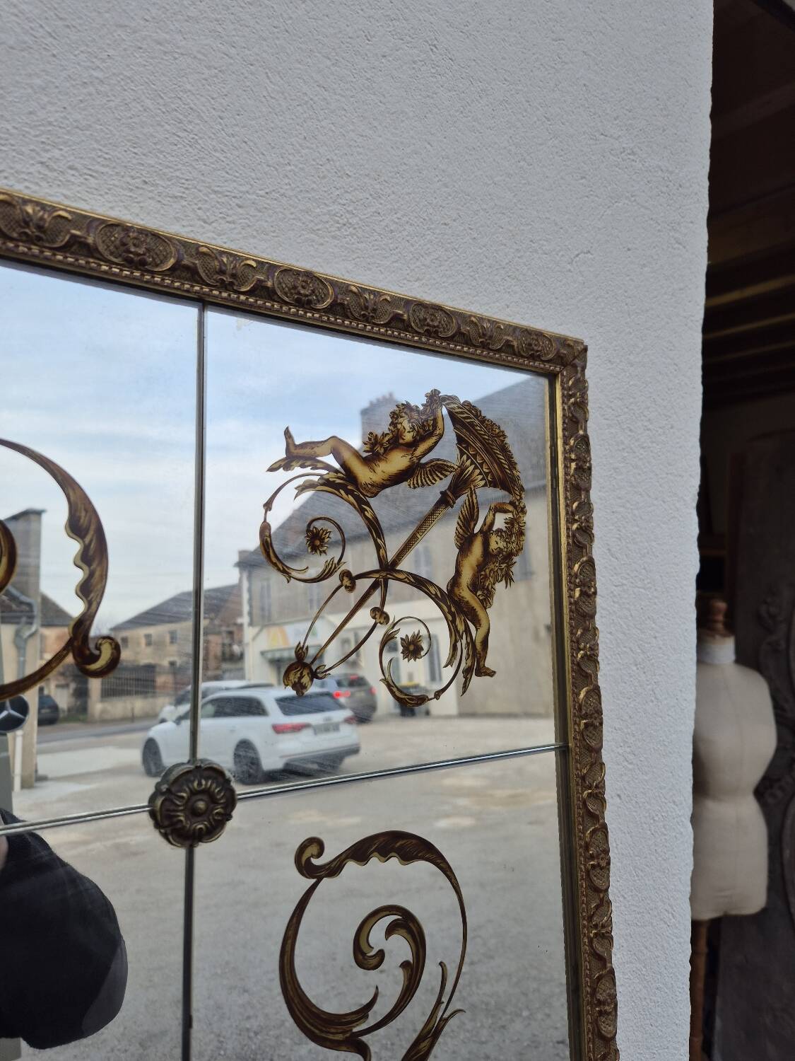 Antique gilded Venetian brasserie mirror in eglomised glass
