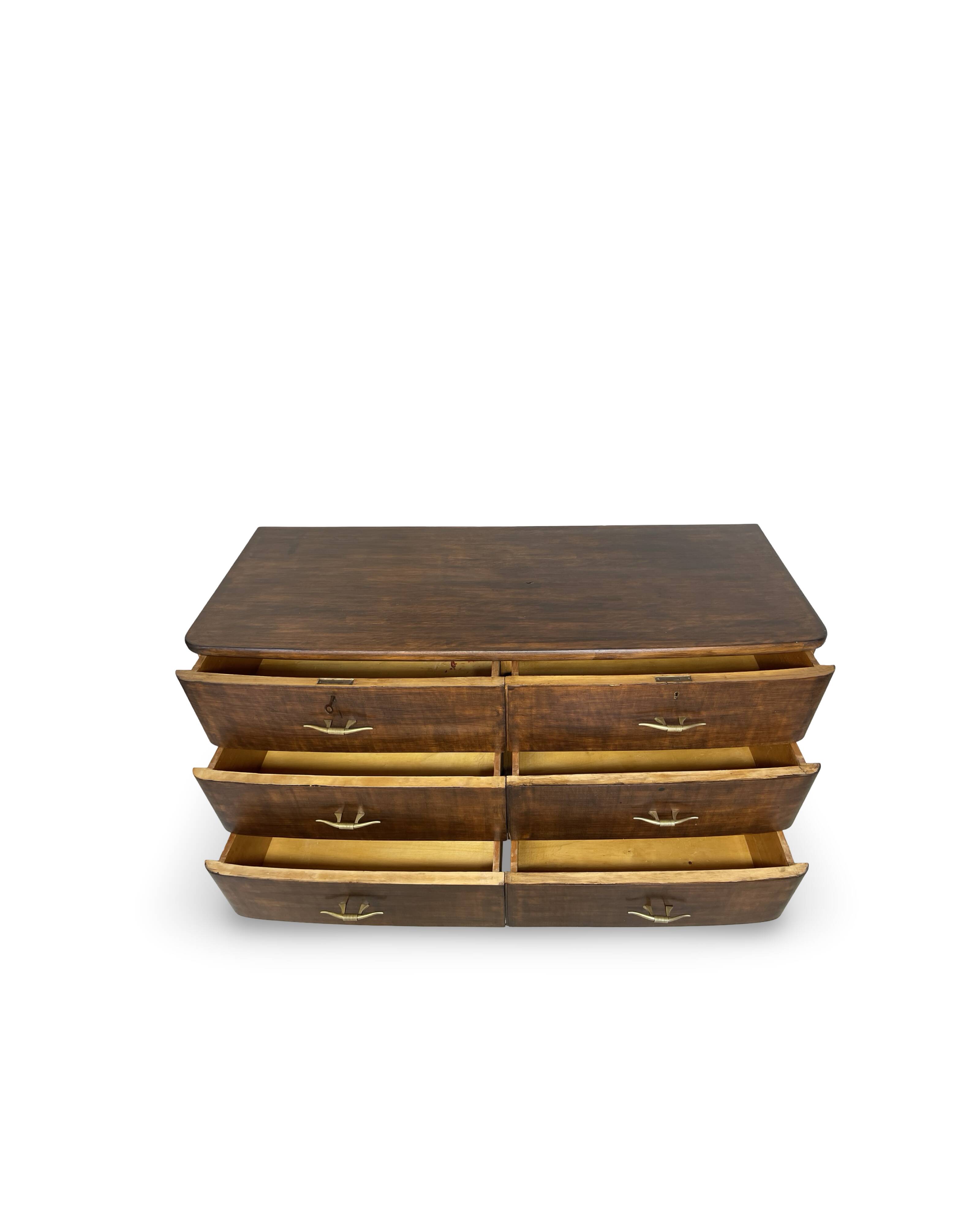 A vintage Italian chest of drawers, made of veneered walnut and solid wood,