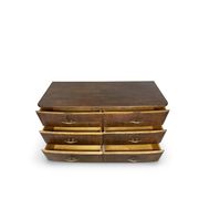 A vintage Italian chest of drawers, made of veneered walnut and solid wood,