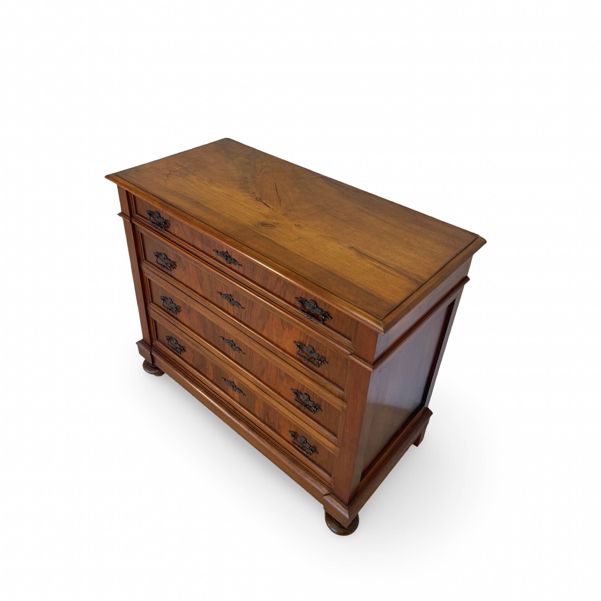 Antique walnut commode with bronze handles in the shape of a lion's mask,