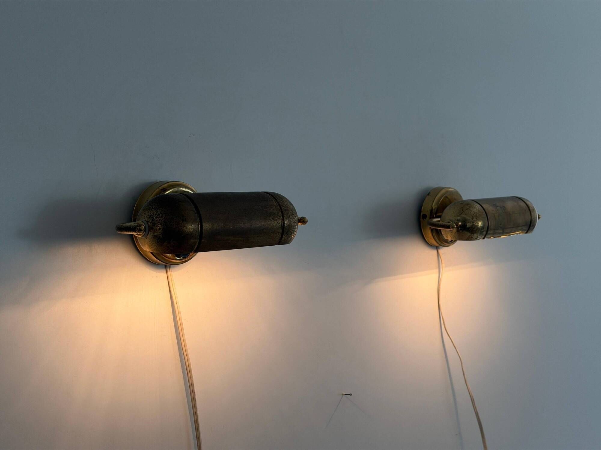 Pair of brass wall lights from the mid-century by N Leuchten, 1960s, Germany.