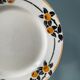 Set of 8 small plates in Badondiller earthenware, Madeleine model