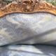 Wooden canapé, natural, formerly gilded in the Louis XV style.
