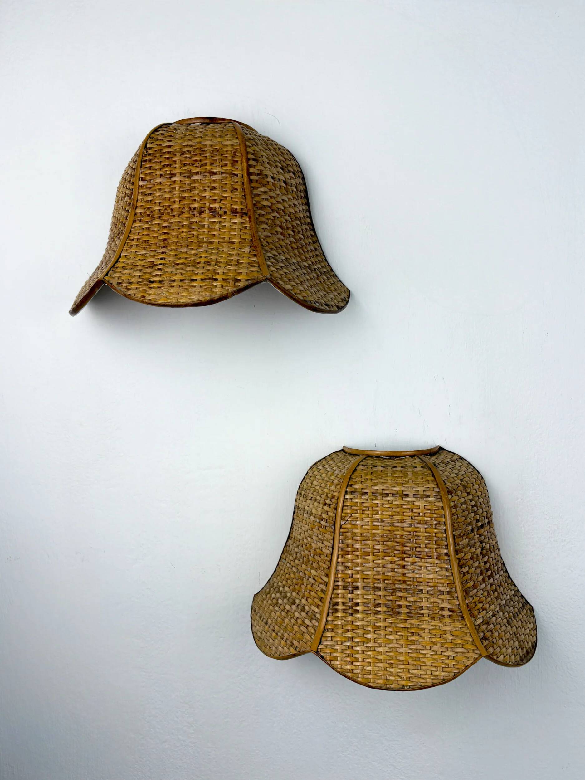 Pair of vintage woven rattan wall shades, Italy 1970s
