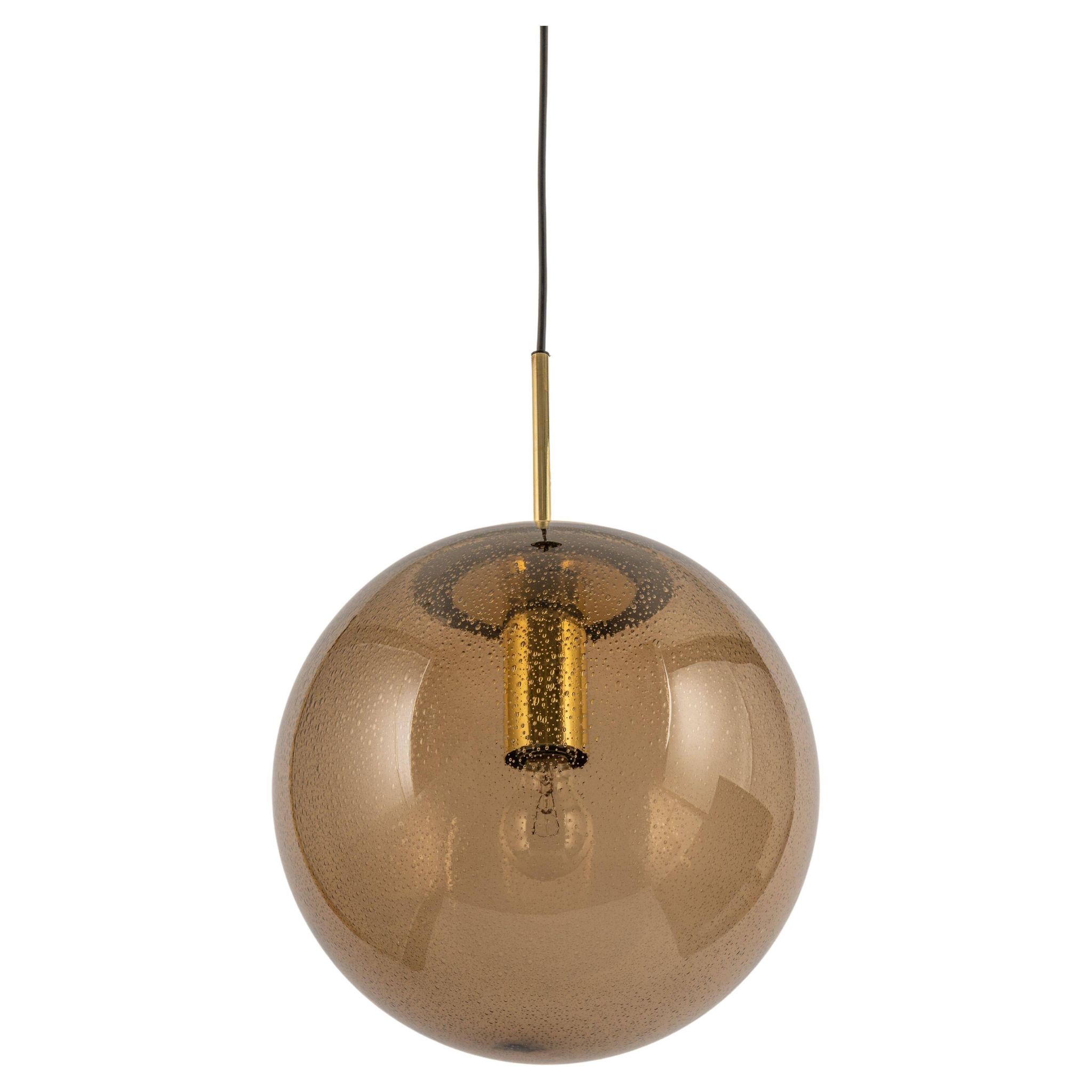 Large smoked glass ball pendant by Limburg with brass, Germany, 1970s.