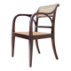Mid-century curved wooden chairs with cane seats and backs.