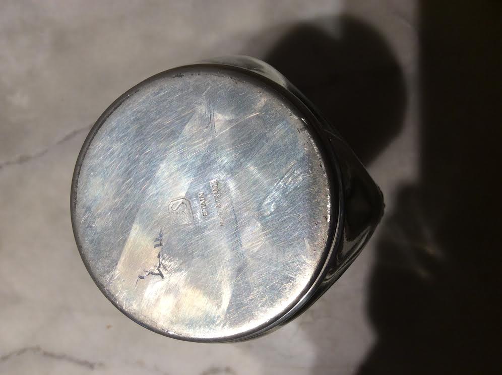 Glass and tin carafe