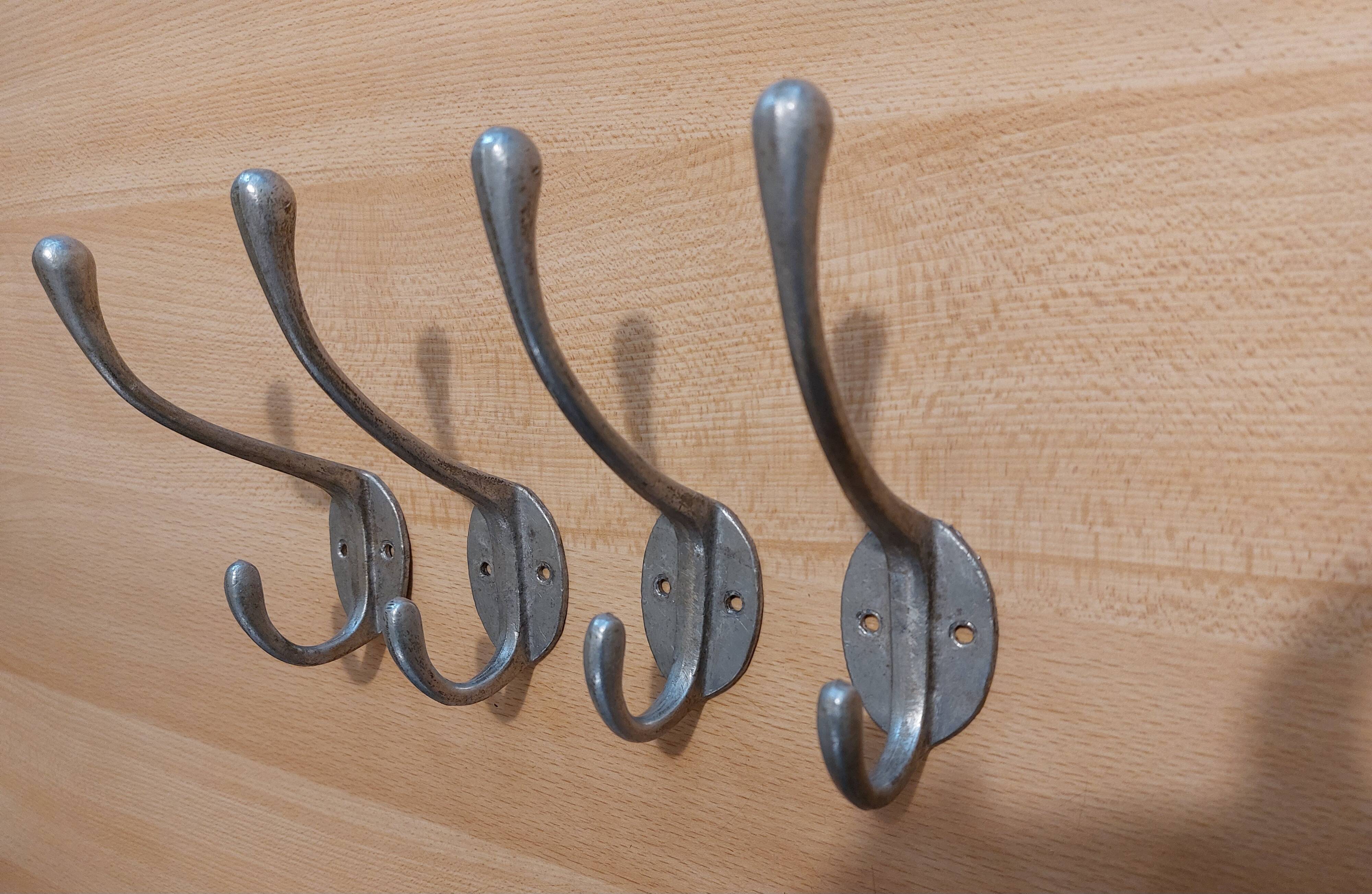 4 old aluminum hooks 30s