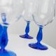 Set of 4 vintage Italian glass wine glasses, clear bowls with royal blue stems, 1980s MCM style