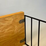 Floating wall shelf in oak veneer and black metal, 1960s.