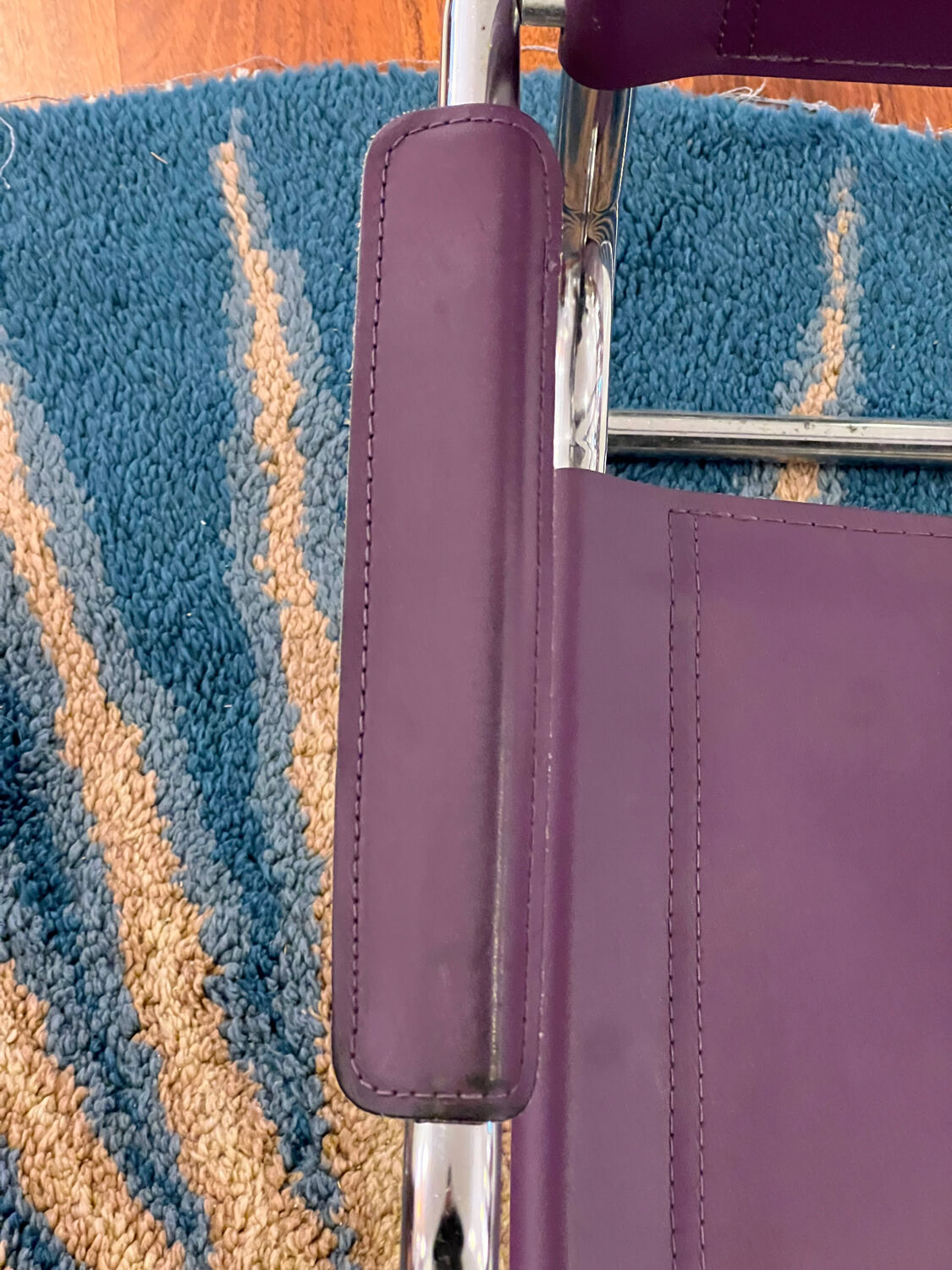 Purple cantilever armchair