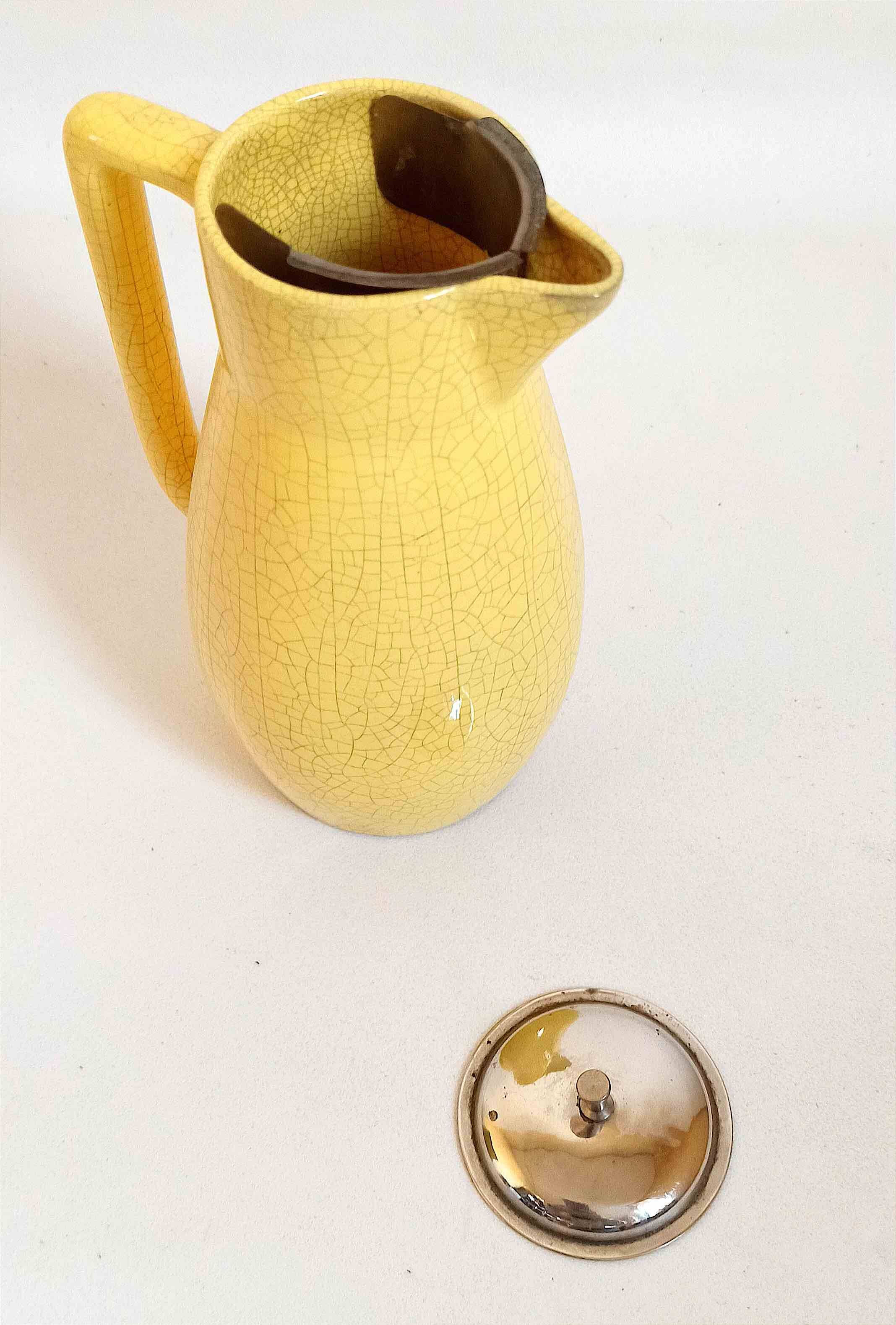 Ceramic orangeade or lemonade pitcher with cracked effect from the 1960s