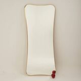 Golden brass mirror in the style of Gio Ponti. 1980s or 1990s.