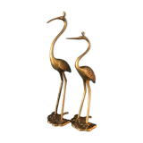 Couple of brass herons