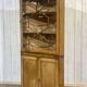 19th-century English corner cabinet in oak, mahogany, and fir.