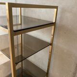 Golden brass and glass shelves