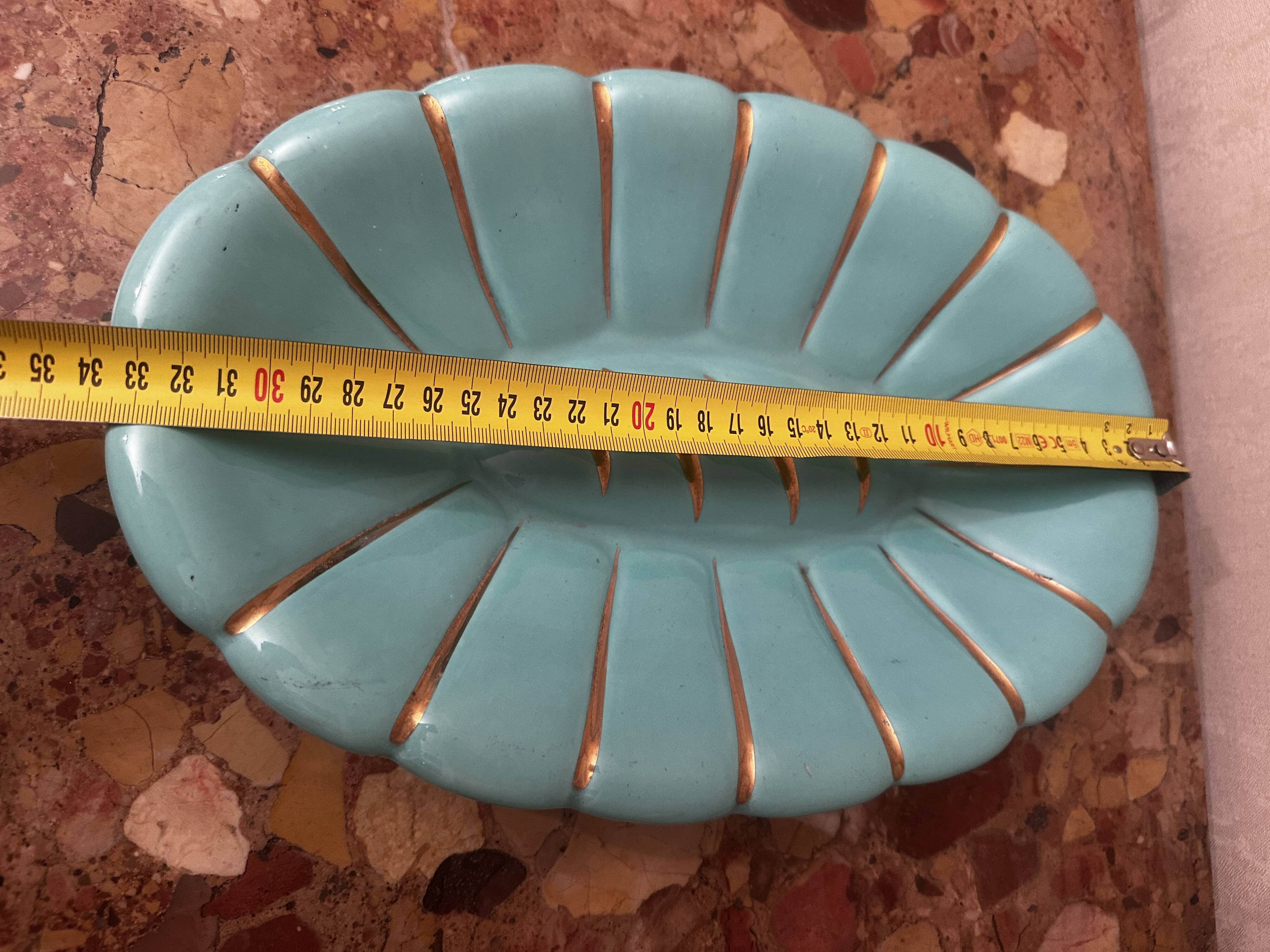 Art Deco ceramic pocket vase in celadon green and gold, style Arthur Percy L34/P22.