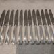 12 silver-plated table knives by Christofle America, 24.5cm